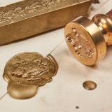 Siegelstempel Wappen & goldenes Wachs